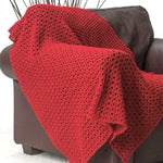 Couverture au crochet rouge