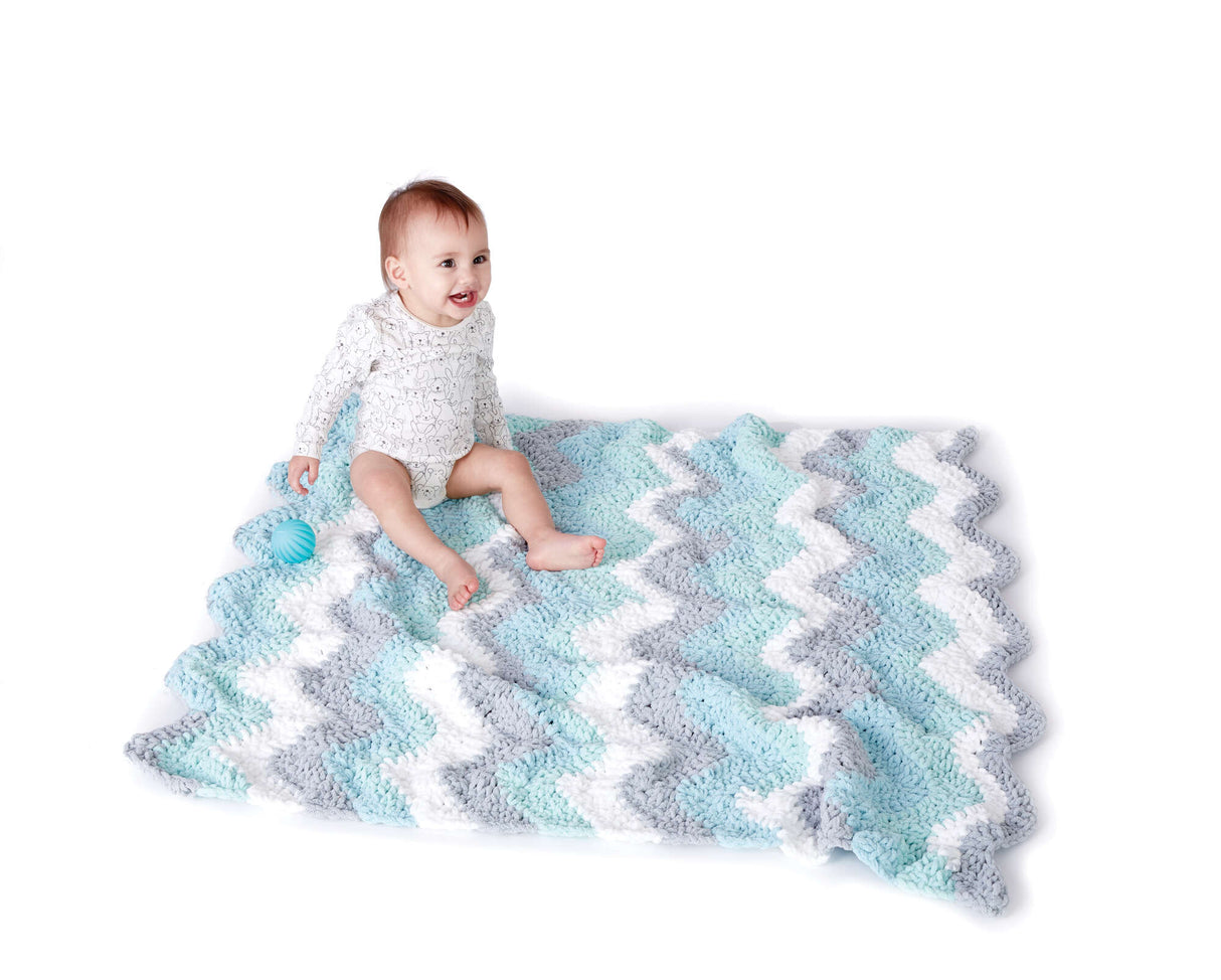 Modèle gratuit de couverture pour bébé à chevrons au crochet