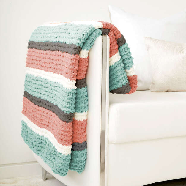 Obtenez gratuitement un modèle de jeté en tricot frais
